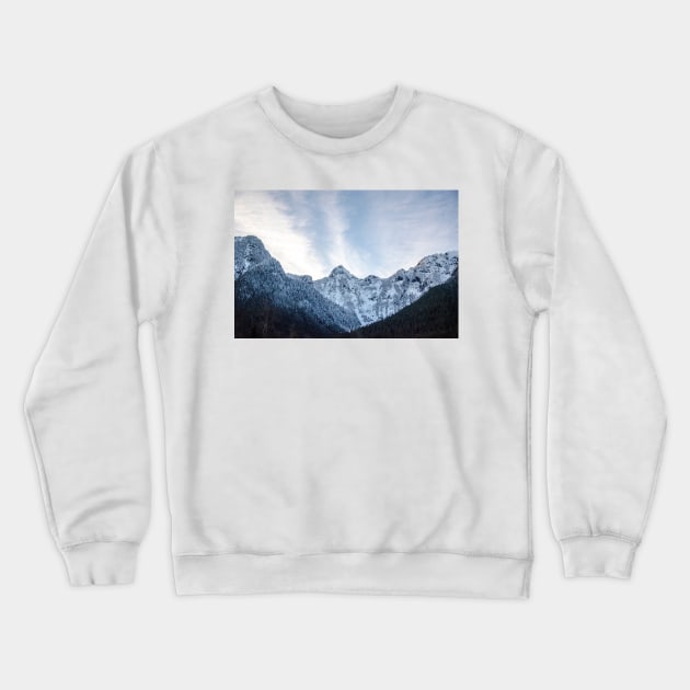 Blue Winter Sky Framed By Snowy Mountains Crewneck Sweatshirt by pmcmanndesign